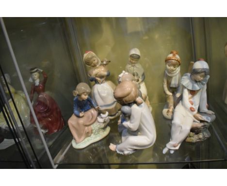 Group of Nao porcelain figures of children, tallest 22cm high (7)  