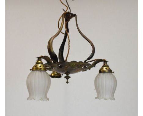 Brass Art Nouveau design three branch ceiling light fitting having hammered finish and pierced and embossed convex base with 