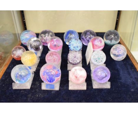 Quantity of Caithness glass paperweights to include; Moonflower, Fountain and Mosaic, some with stands (19)  