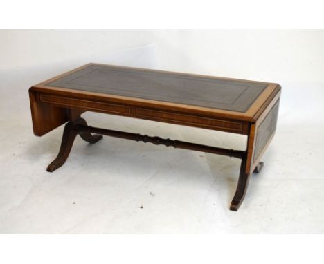 Reproduction mahogany sofa table style coffee table having inset leather top, 105cm wide with flaps down  