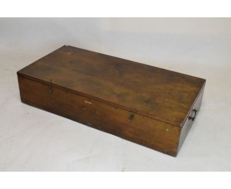 Large wooden trunk or case of shallow form with carry handles and hinged cover, 122cm wide  