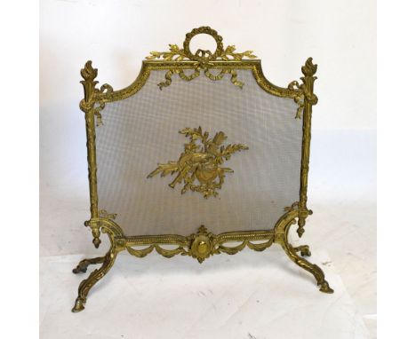 Cast brass and mesh firescreen in the Neo Classical taste, 66cm wide x 76cm high  