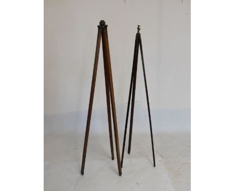 Two vintage tripods, the taller standing 143cm high when closed  