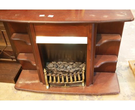 Electric fire and wooden surround, 105 x 80 x 25 cm. This lot is not available for in-house P&amp;P, please contact the offic