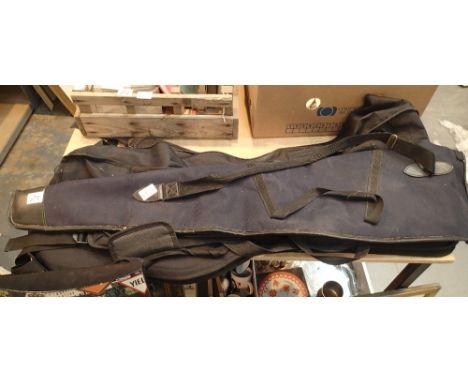 Two canvas guitar cases and a canvas gun bag. P&amp;P Group 1 (£14+VAT for the first lot and £1+VAT for subsequent lots) 