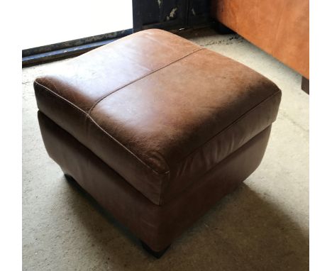 A modern brown leather upholstered scroll arm chair 104 cm wide x 95 cm deep x 72 cm high and matching stool on square tapere