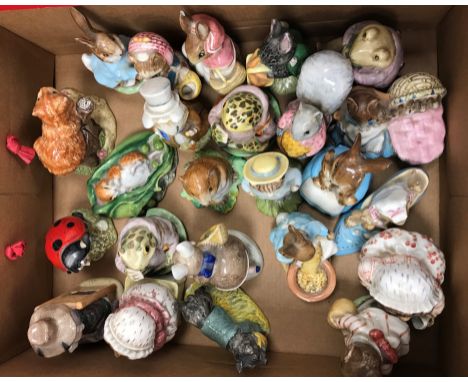 A collection of twenty-four various Beswick and Royal Albert Beatrix Potter figures including "Mrs Tittlemouse", gold back st