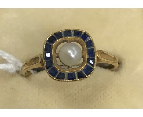 A 20th Century unmarked gold sapphire and pearl set dress ring circa 1915-1920, UK ring size L