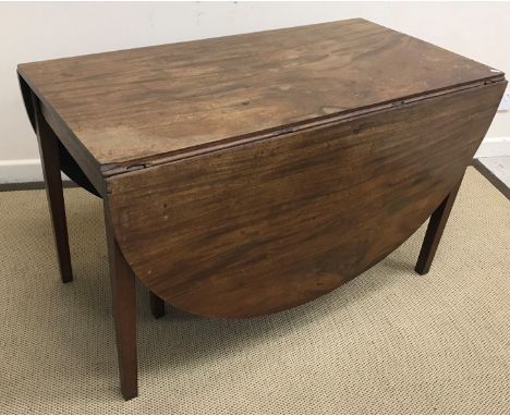 A collection of furniture comprising a Georgian mahogany drop leaf dining table 121 cm wide x 63 cm deep (leaves down) x 73.5