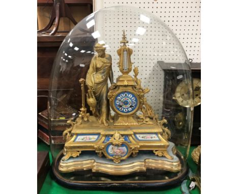 A 19th Century French gilt metal cased mantel clock, the eight day movement with circular bleu celeste porcelain and floral b