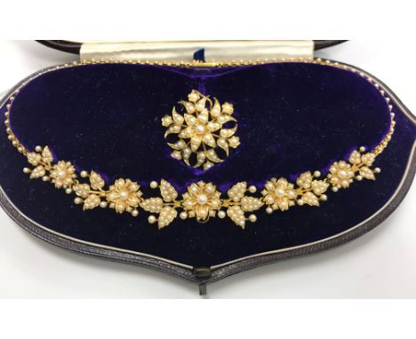 A circa 1900 gold and seed pearl mounted necklace and pendant group of foliate and flower head design, 33 g total CONDITION R