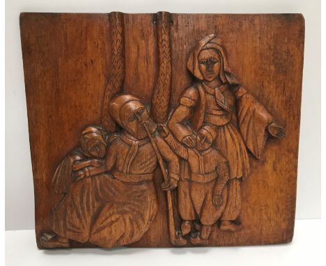 An 18th Century Continental oak and carved panel with central figural bust medallion amongst scrolling foliage 52 cm x 19 cm 