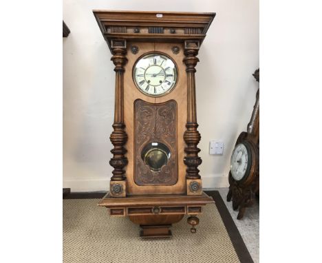 A 19th Century walnut cased Vienna style regulator with carved stylised dolphin decoration in the Gothic/Art Nouveau style, t