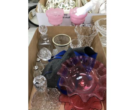 A collection of glassware to include a cranberry glass two tier centre piece, celery style vase, cranberry glass oil jar, lar