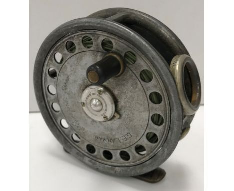 A Hardy St. George 3 3/8" alloy fly reel bearing ownership inscription "GE Larman Rochford Essex" with agate ring and ebonite