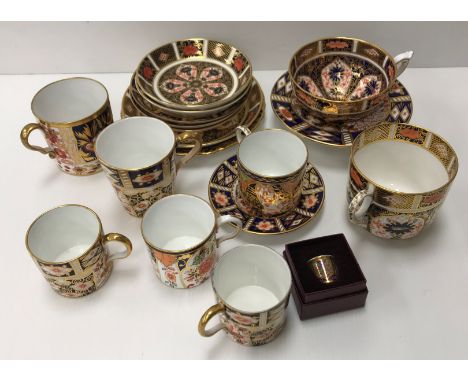 A collection of circa 1900 and later Japan pattern teacups, coffee cans and saucers by various factories including Davenport,