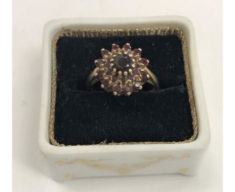 A 9 carat gold set garnet cluster dress ring 3.9 g, UK ring size P