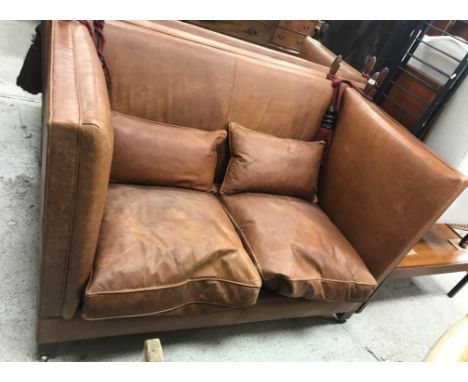 A modern Mulberry Knowle type brown leather upholstered two seater sofa 151 cm long at the base x 100 cm deep x 117 cm high i