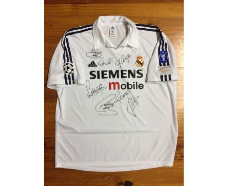 Real Madrid 2002 Signed Football Shirt: Official club shirt with centenary logo and 9 European Cup to sleeve. Signed by 6 Gal