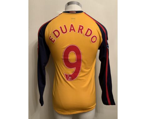 Eduardo 2008/2009 Match Worn Arsenal Away Football Shirt: Yellow long sleeve shirt worn in a Premier League match. Number 9 t