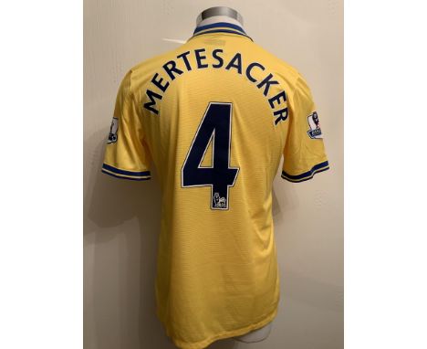 Mertesacker 2013/2014  Match Worn Arsenal Away Football Shirt: Yellow short sleeve shirt worn in a Premier League match. Numb