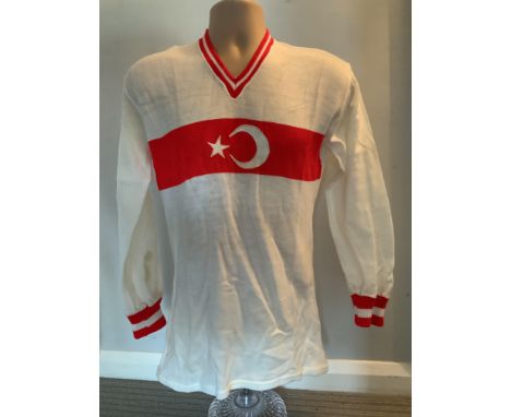 1974 Turkey Match Worn Football Shirt: White long sleeve with red trim including stripe to middle and number 9 to rear. Worn 