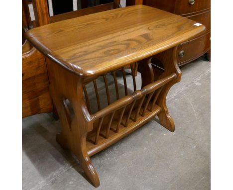 An Ercol Golden Dawn ash magazine rack 