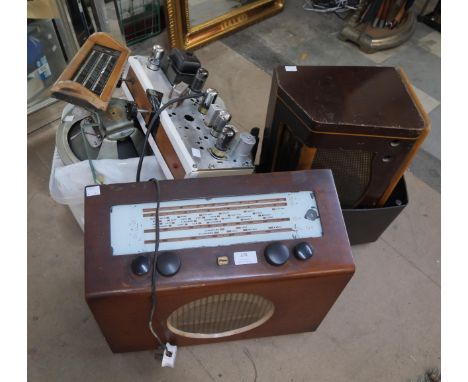 A vintage radio and radio parts, dials, speakers, transformers, etc. 