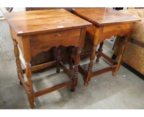 A pair of George III style hardwood single drawer lamp tables 