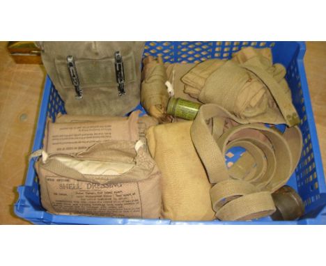 Box of vintage and later militaria including water bottle, putties, field dressings etc.