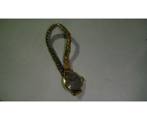 Vintage Ladies Omega watch in 9 ct gold case with articulated strap