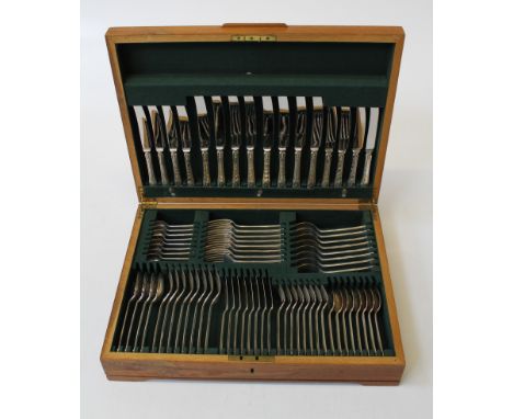 A sterling silver canteen of cutlery for eight persons. Boxed. Appears unused. Copper Brothers and Sons, Sheffield 1969. Weig