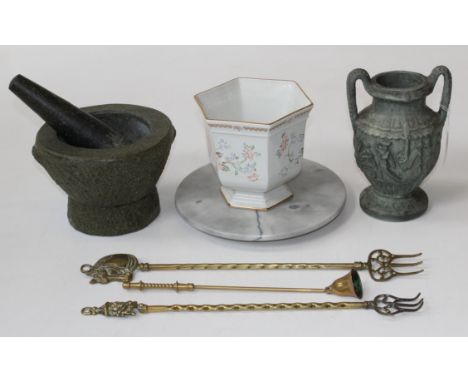 A stone pestle and mortar, composite marble lazy Susan, reproduction Greek urn, 22cm high, toasting forks and a florally deco