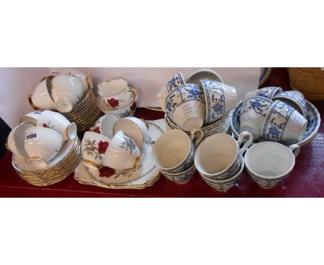 A Royal Standard Roses to Remember part tea service - sold with a modern blue and white similar