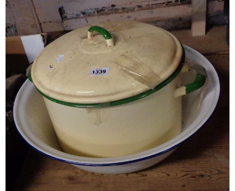 A large enamel two handled saucepan in cream and green livery - sold with a large enamel bowl