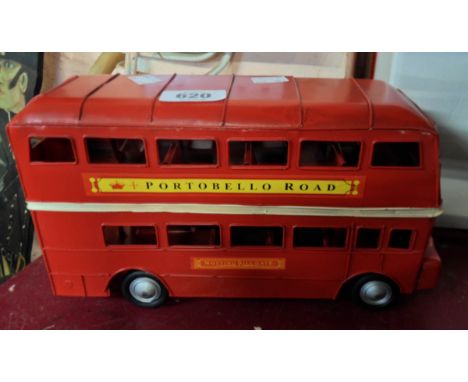 A modern painted tin model of a London bus