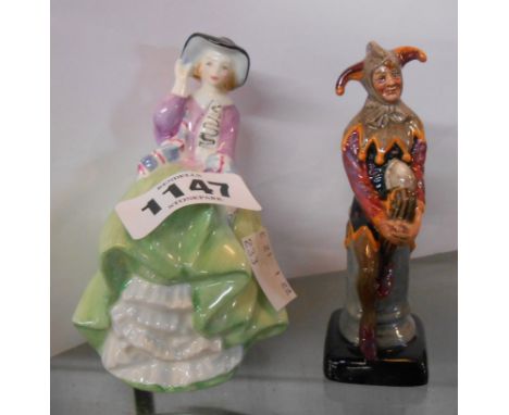 Two Royal Doulton figurines comprising The Jester HN3335 and Top 'o the Hill HN2126 - sold with a Royal Doulton International