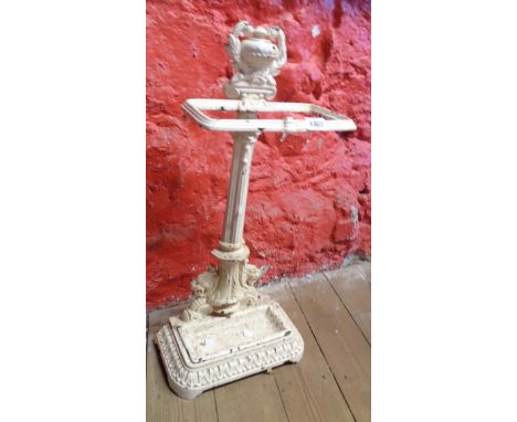 A Victorian cast iron stick stand of single pillar form with dragon brackets and urn with removable drip tray - registered di