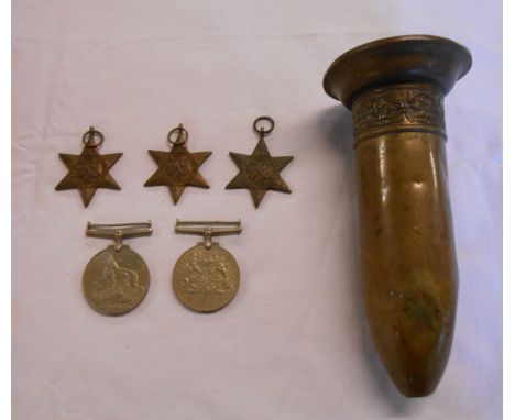 Five World War II medals comprising France/Germany star, Italy star, 1939/45 star, Defence and Service - sold with a trench a