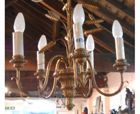 A vintage five branch chandelier style ceiling light with giltwood and metal wheatsheaf form decoration