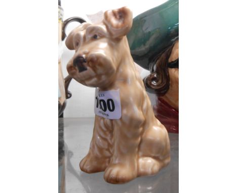 A SylvaC brown glazed model of a seated Terrier - Model 1378