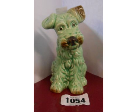 A SylvaC green glazed model of a seated terrier - Model Number 1378