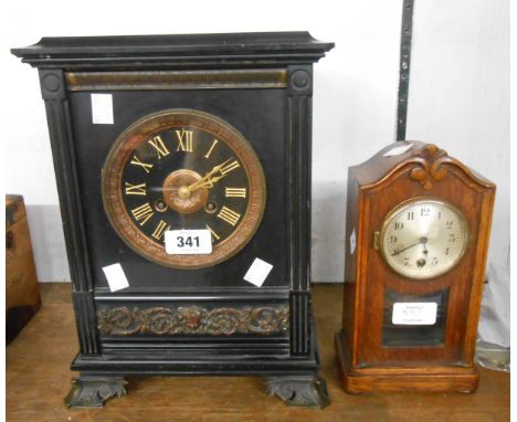 A late Victorian black slate cased mantle clock with eight day gong striking movement - sold with a small oak cased desk time