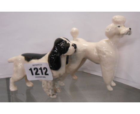 A Beswick model of a poodle and a spaniel similar