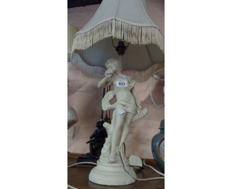 A cast plaster table lamp in the form of a classical figure