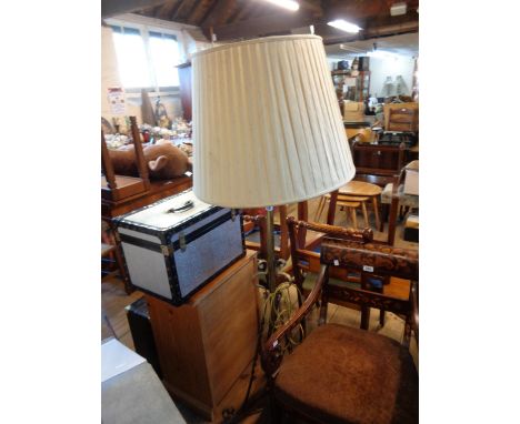 A Victorian brass telescopic lamp standard (converted to electricity) with shade and ornate triple scroll supports