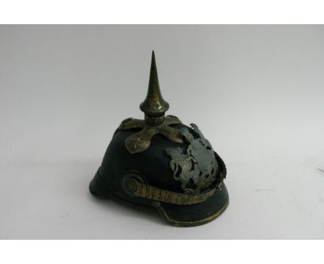 An Imperial German Officer Pickelhaube helmet with a possible silk liner refurbishment 