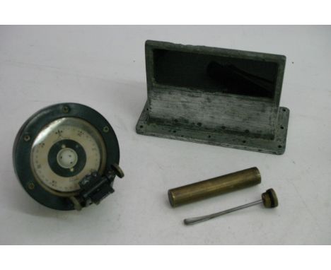 A Saura Tokyo ship's compass, periscope fitting and brass .303 rifle oil cleaning dispenser