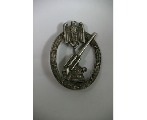 A German WWII anti-aircraft war badge, army type, (Junker, Berlin)