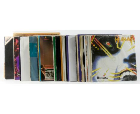 Eighty vinyl singles, mainly rock and metal, to include Thin Lizzy - Whisky In the Jar/Vagabonds Of The Western World, Iron M